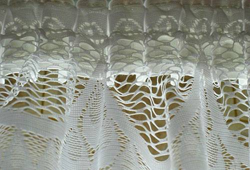 Traitement du bord supérieur du rideau de tulle