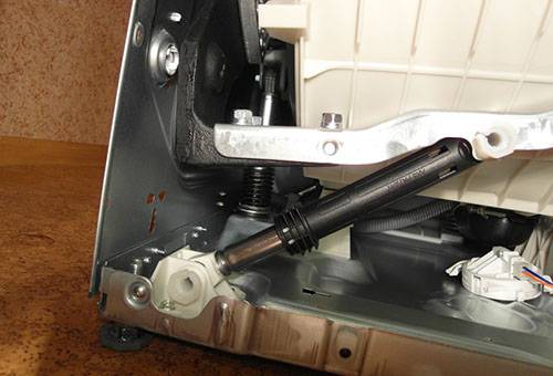 Amortisseur dans la machine à laver