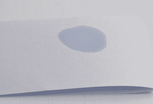 tache de graisse sur papier