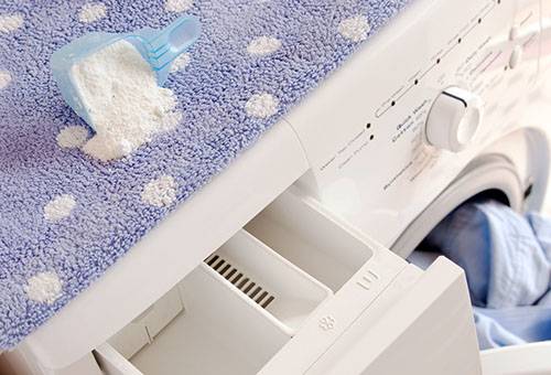 Compartiment pour le baume dans la machine à laver