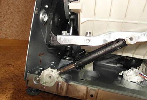 Amortisseur dans la machine à laver