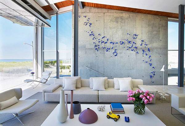 Composition de papillons de papier sur le mur