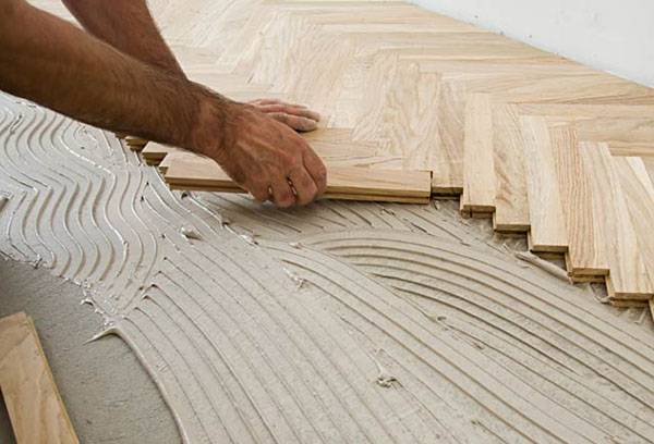 Pose de parquet sur colle
