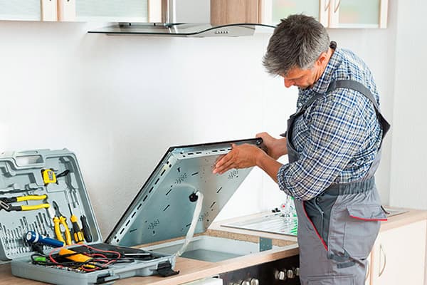 Réparation de table de cuisson