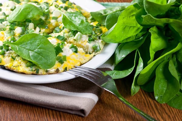 Œufs frits aux épinards